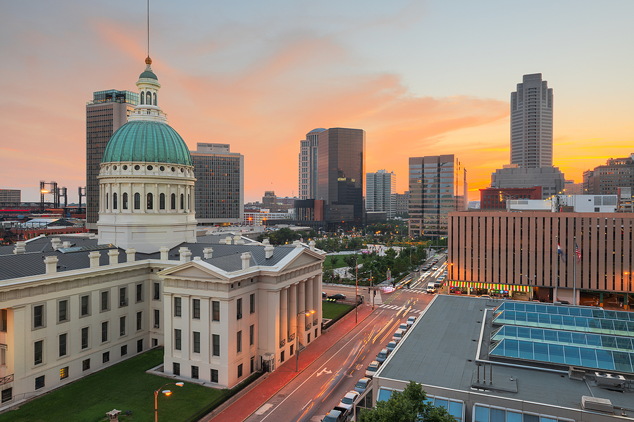 St. Louis, Missouri, USA downtown cityscape with the old courthouse at dusk.