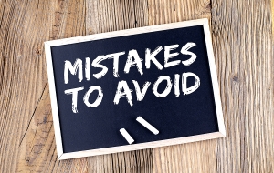MISTAKES TO AVOID text on chalkboard 